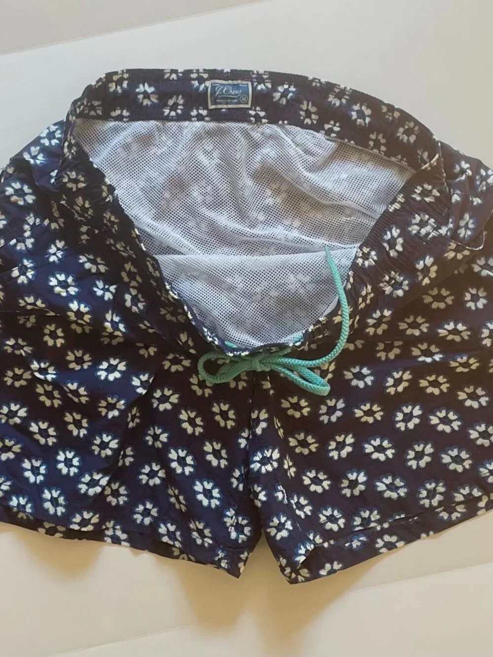 J. Crew men's swim shorts, navy with white flowers, size Medium